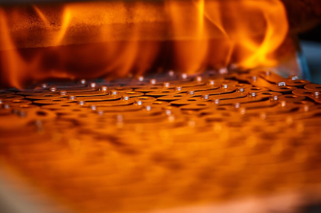 Wire mesh belt in a furnace.